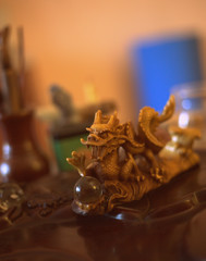 Fototapeta na wymiar tea board with dragon tea figurine