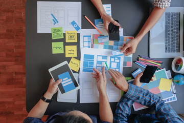 Soft Focus and Blur,A group of web designers are working together to develop a mobile responsive...