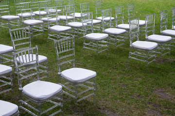 Beautiful setting for outdoors wedding ceremony waiting for bride and groom and guests. Wedding