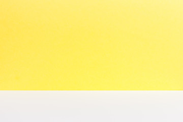 Empty of wood white table top on yellow pastel color background.For montage product display or design key visual layout.