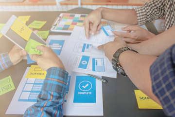 Soft Focus and Blur,A group of web designers are working together to develop a mobile responsive...