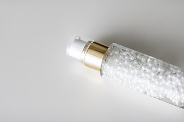 Serum gel or make-up primer in bottle, luxury skincare cosmetics and organic anti-aging product for...