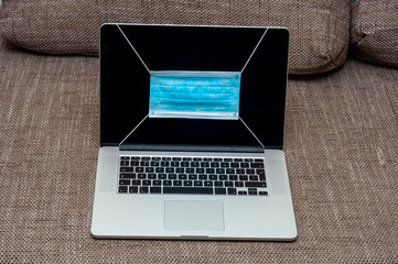 View on a medical mask on a laptop display.