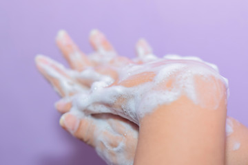 WASHING HANDS WITH SOAP. THE RIGHT STEP IN PREVENTING VIRUS