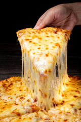 Stretched cheese pizza 