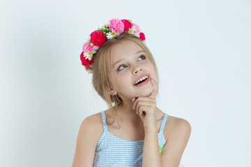 little Girl thinking daydreaming having idea hand on chin