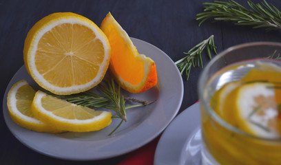 Summer healthy lemonade, cocktails made from citrus water or mojito infusion, with lime, lemon, orange, ice and mint, diet drinks. Antioxidant in healthy food.