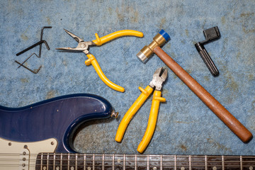 Luthier workbench with tools and an eletric guitar