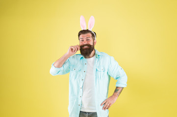 Lucky guy. Man long rabbit ears. Bearded man Easter rabbit costume. Easter bunny or hare. Hipster dressed for Easter party. Easter bunny symbol of fertility and spring. Having fun. Barber salon