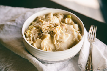 Bowl of homemade chicken and dumplings. 