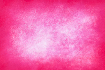 An abstract vignette pink paint sponged background image.