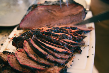 Sliced smoked beef brisket with nice smoke ring. 
