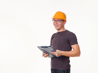 young man - worker in a helmet with a folder