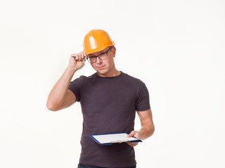young man - worker in a helmet with a folder