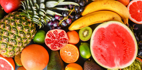 Composition with assorted raw organic fresh vegetables wide banner. Assortment of fruits and vegetable. Healthy raw detox food diet panorama concept.