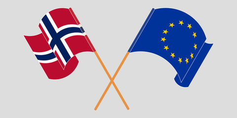 Crossed and waving flags of Norway and the EU