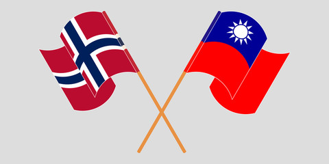 Crossed and waving flags of Norway and Taiwan