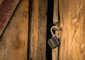 open padlock on the door