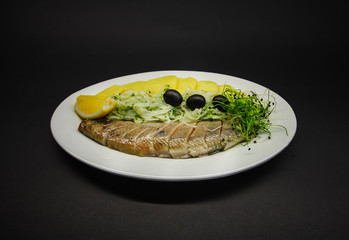 tasty food on a black background, dark background dishes of different countries, plates salads meat