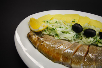 tasty food on a black background, dark background dishes of different countries, plates salads meat