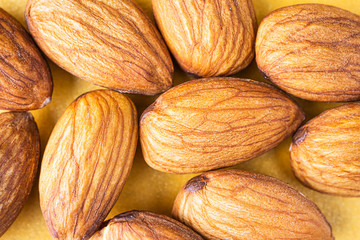 Peeled almonds close-up. Macro photo of nuts. The concept of healthy food, vegetarianism...