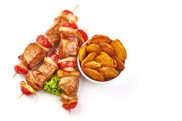Grilled Shish kebab. Skewers with pieces of roasted barbecue, isolated on white background