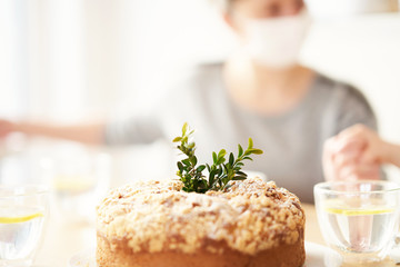 Family at home quarantine over Easter table