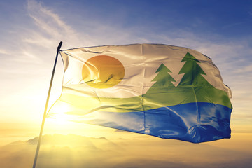 Kawartha Lakes of Ontario of Canada flag waving on the top sunrise mist fog