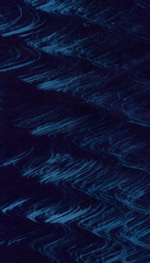 Hand-drawn art background painted in watercolor and acrylic. Dry brush mark on a black background. Stains, lines and dots - neon effect.