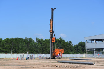 diesel hammer pile driving machine working on construction field