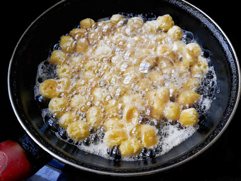 Struffoli Frying at Skillet