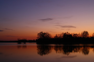 Fototapeta na wymiar Beautiful sunset with orange clouds