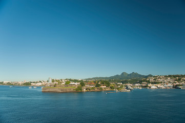 Distant Caribbean Island port from a Cruise ship