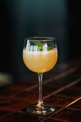 Melon Fizz cocktail on the bar counter. Close-up.