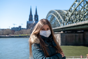 young woman wearing a protective medical mask