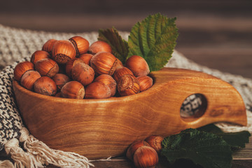 Hazelnuts in wooden bowl