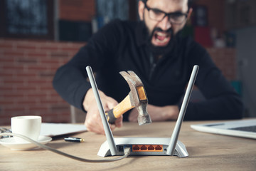 angry man with Wifi router
