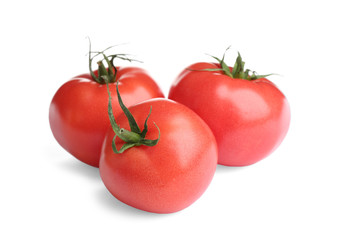 Fresh ripe organic tomatoes isolated on white