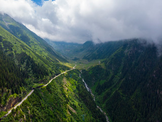 Romania. Fagaras mountain range. Mountain highway Transfagarash. One of the most beautiful roads in the world. Popular tourist route. Drone. Aerial view