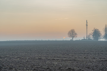 Breuschwickersheim, France - 12 25 2018: Sunset over a countryside landscape near Strasbourg
