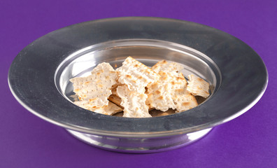 The Elements of the Holy Communion or Lords Supper on a Purple Table