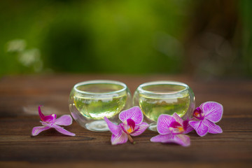 Obraz na płótnie Canvas delicious green tea in beautiful glass bowl on table