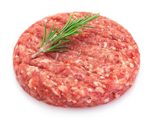 Raw burger cutlet on white background