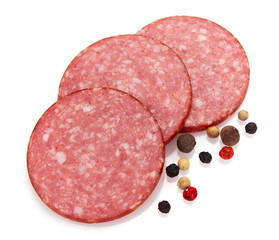 Sliced salami smoked sausage on white background