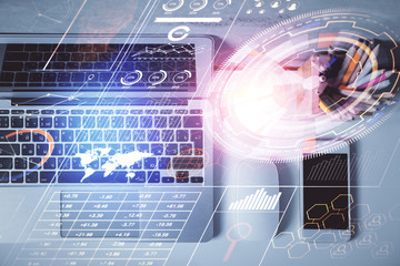 Multi exposure of data drawing hologram over topview of study desk background with computer. Concept of technology.