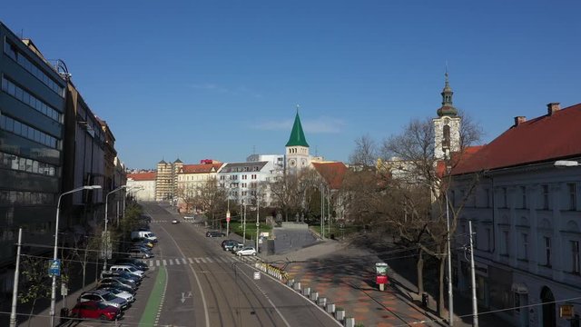 flying above railways on empty SPN square in centre Bratislava, with tram