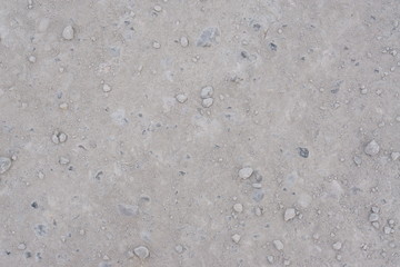 rocky path. dry soil with small stones background