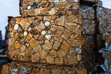 Detail of a block of rusty compacted cans