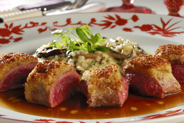 Lamb crusted with almond and mushroom risotto