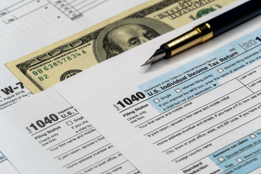 Detail closeup of current tax forms for IRS filing